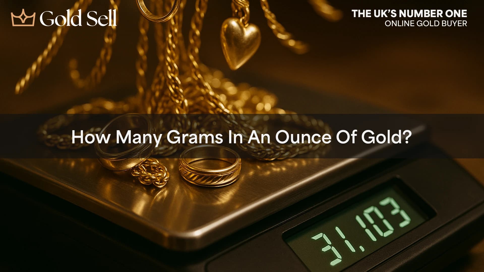 Gold jewellery on digital scale reading 31.103 grams, illustrating grams in an ounce of gold and gold price per ounce.