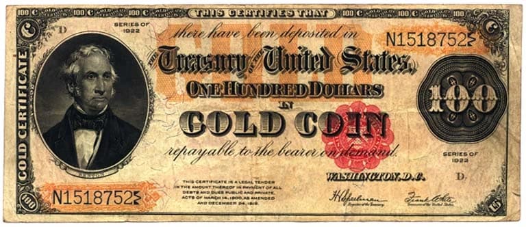 A US $100 gold certificate (Series 1922), which was paper currency redeemable in gold.
