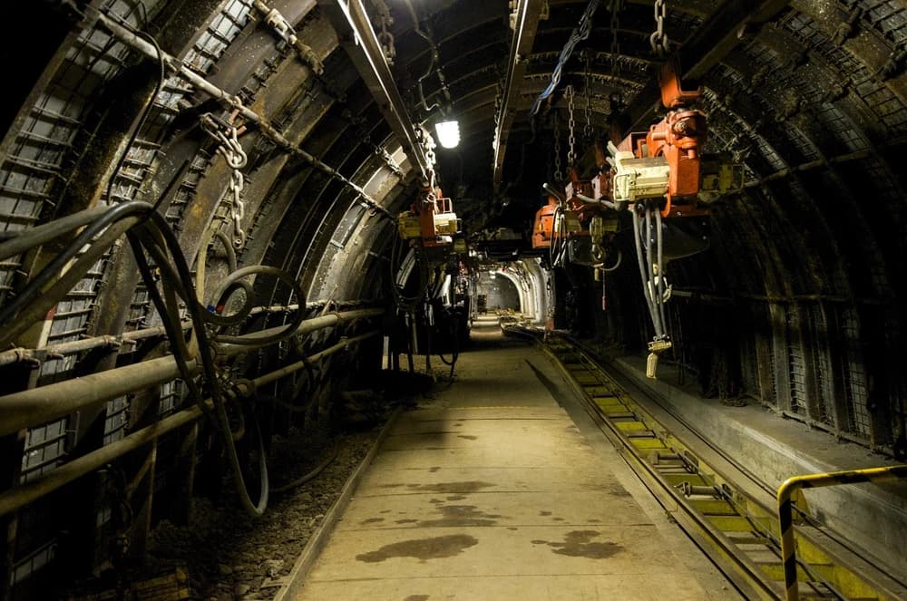 An underground gold mine with gold mining equipment.