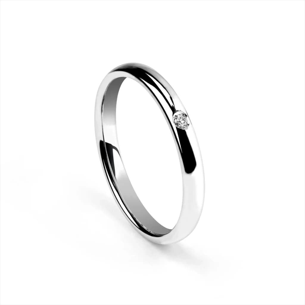 A close-up of a platinum ring with a single diamond, showing what is platinum used for in high-end platinum jewellery.