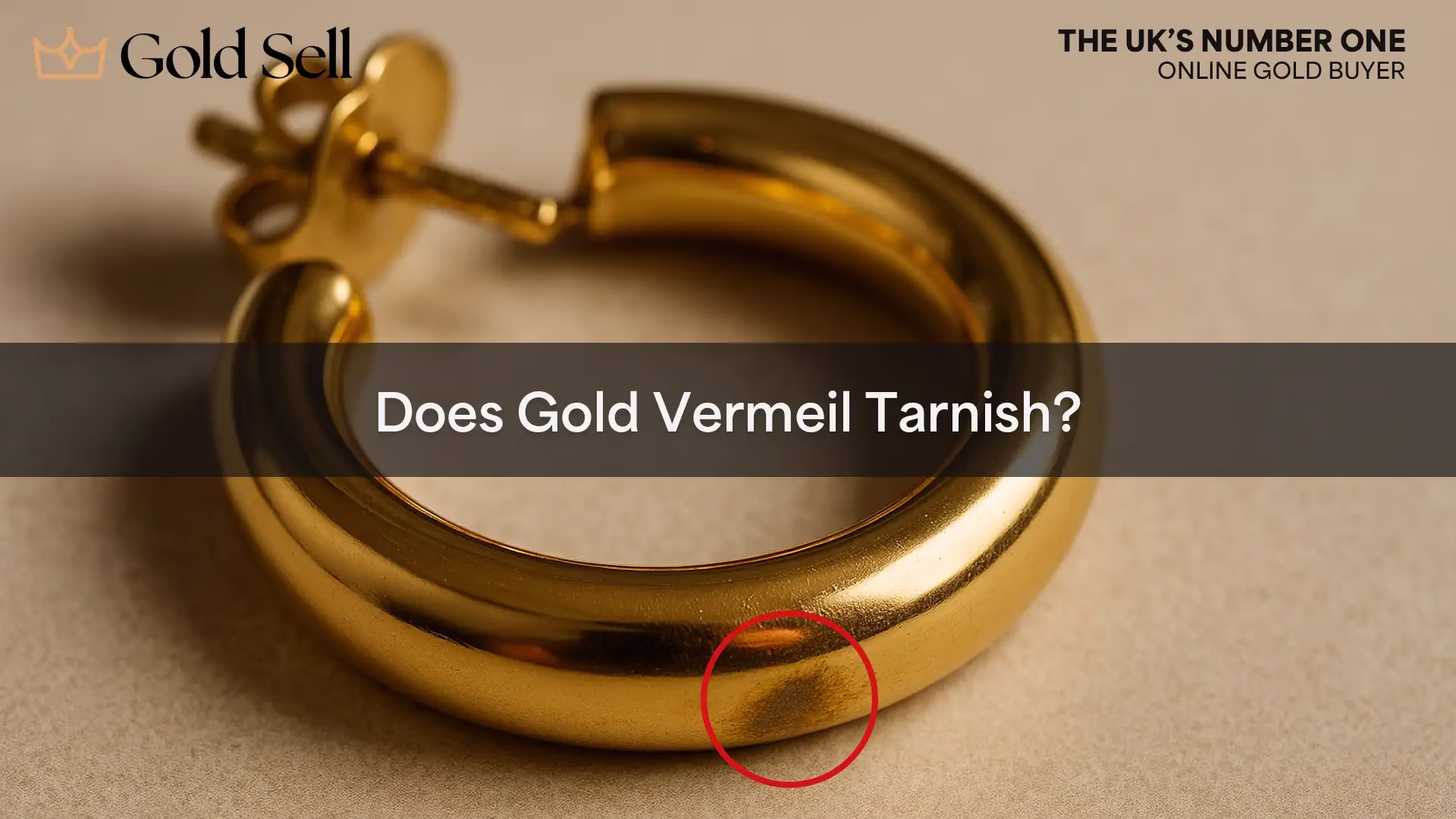 Close-up of a gold earring with slight tarnish used to illustrate the question does gold vermeil tarnish?