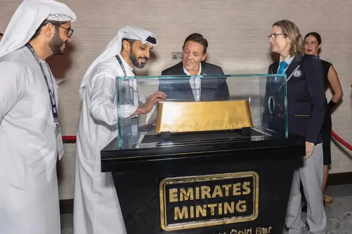 Biggest gold bar in the world displayed in glass case at Emirates Minting facility.